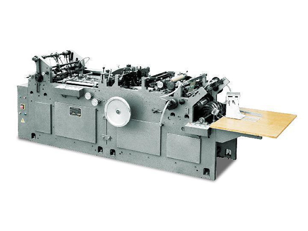 Máquina para fabricar sobres para bancos automática